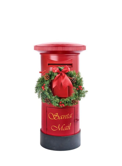 A red Christmas post box with a green pine wreath, red bow, and gold 'Santa Mail' lettering, isolated on a white background.