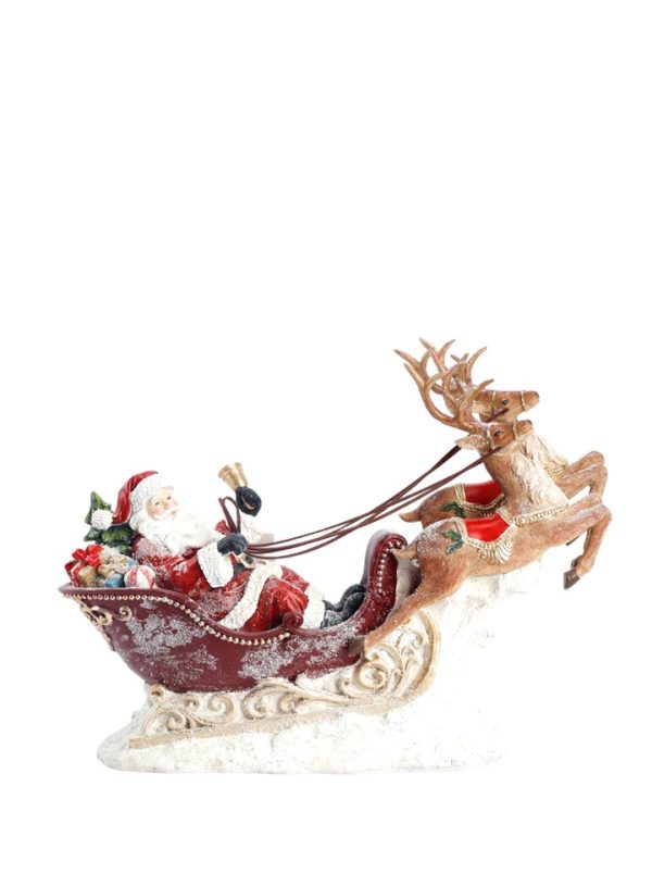 A Santa Claus Christmas ornament figurine in his sleigh, pulled by a brown reindeer, set against a plain white background.